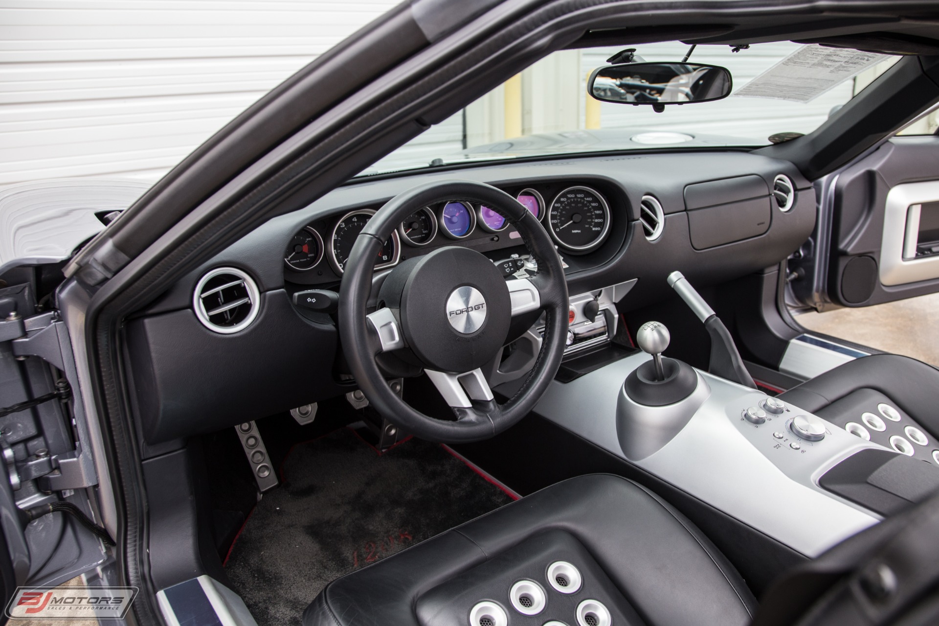 Used-2006-Ford-GT-in-Tungsten-with-Silver-Stripes-Red-Calipers-3-Option-Ford-GT